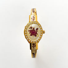 Load image into Gallery viewer, Vintage Andr√© Mouche Quartz Watch with Enamel Floral Design, Concealed Dial and Gold-Plated Bangle Bracelet

