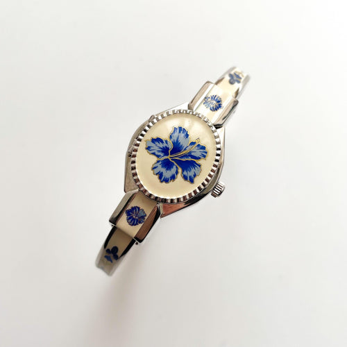 Vintage Andr√© Mouche Quartz Watch with Beige and Blue Enamel Floral Design, Concealed Dial and Stainless Steel Bangle Bracelet