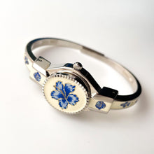 Load image into Gallery viewer, Vintage Andr√© Mouche Quartz Watch with Beige and Blue Enamel Floral Design, Concealed Dial and Stainless Steel Bangle Bracelet
