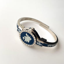 Load image into Gallery viewer, Vintage Andr√© Mouche Quartz Watch with Navy Enamel Floral Design, Concealed Dial and Silver-Tone Bangle Bracelet
