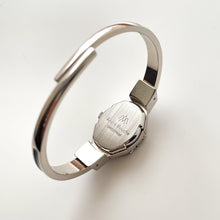 Load image into Gallery viewer, Vintage Andr√© Mouche Quartz Watch with Green Enamel Floral Design, Concealead Dial and Silver-Tone Bangle Bracelet

