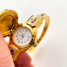 Load image into Gallery viewer, Vintage Andr√© Mouche Quartz Watch with Enamel Floral Design, Concealed Dial and Gold-Plated Bangle Bracelet
