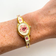 Load image into Gallery viewer, Vintage Andr√© Mouche Quartz Watch with Pink Enamel Floral Design, Concealed Dial and Gold-Plated Bangle Bracelet

