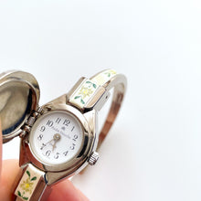 Load image into Gallery viewer, Vintage Andr√© Mouche Quartz Watch with Enamel Floral Design, Concealed Dial and Silver-Tone Bangle Bracelet
