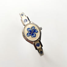 Load image into Gallery viewer, Vintage Andr√© Mouche Quartz Watch with Beige and Blue Enamel Floral Design, Concealed Dial and Stainless Steel Bangle Bracelet
