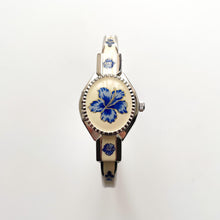 Load image into Gallery viewer, Vintage Andr√© Mouche Quartz Watch with Beige and Blue Enamel Floral Design, Concealed Dial and Stainless Steel Bangle Bracelet
