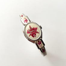 Load image into Gallery viewer, Vintage 1999 Andr√© Mouche Quartz Watch with Pink Enamel Floral Design, Concealed Dial and Silver-Tone Bangle Bracelet
