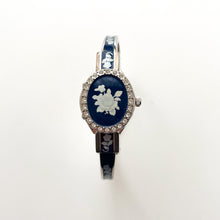 Load image into Gallery viewer, Vintage Andr√© Mouche Quartz Watch with Navy Enamel Floral Design, Concealed Dial and Silver-Tone Bangle Bracelet
