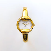 Load image into Gallery viewer, 90s Gold-Plated Gucci 1400L Bangle Quartz Watch with Horsebit Design
