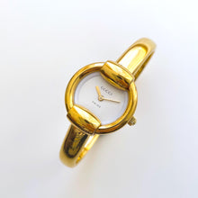 Load image into Gallery viewer, 90s Gold-Plated Gucci 1400L Bangle Quartz Watch with Horsebit Design
