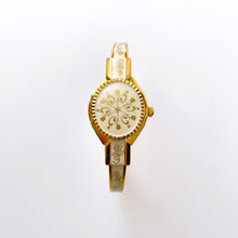 Load image into Gallery viewer, Vintage Andr√© Mouche Quartz Watch with Enamel Floral Design, Concealed Dial and Gold-Plated Bangle Bracelet
