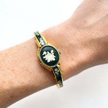 Load image into Gallery viewer, Vintage Andr√© Mouche Quartz Watch with Dark Green Enamel Floral Design, Concealed Dial and Gold-Plated Bangle Bracelet
