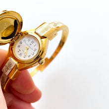 Load image into Gallery viewer, Vintage Andr√© Mouche Quartz Watch with Enamel Floral Design, Concealed Dial and Gold-Plated Bangle Bracelet
