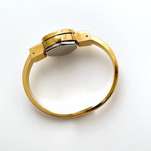 Load image into Gallery viewer, Vintage R. M√ºller Quartz Watch with Blue Enamel Floral Design, Concealed Dial and Gold-Plated Bangle Bracelet
