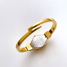 Load image into Gallery viewer, Vintage Andr√© Mouche Quartz Watch with Blue Enamel Floral Design, Concealed Dial and Gold-Plated Crystal-Set Bangle Bracelet
