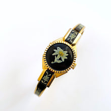 Load image into Gallery viewer, Vintage Andr√© Mouche Quartz Watch with Black and Green Enamel Floral Design, Concealed Dial and Gold-Plated Bangle Bracelet
