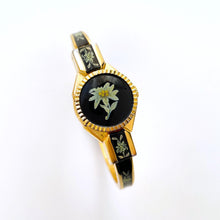 Load image into Gallery viewer, Vintage Andr√© Mouche Quartz Watch with Black and Green Enamel Floral Design, Concealed Dial and Gold-Plated Bangle Bracelet
