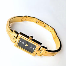 Load image into Gallery viewer, Vintage 1990s Gold-Plated Ladies&#39; Givenchy &#39;Millesime&#39; Bangle Quartz Watch with Black Rectangular Dial
