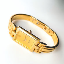 Load image into Gallery viewer, Vintage Gold-Plated Ladies&#39; Givenchy &#39;Millesime&#39; Bangle Quartz Watch with Rectangular Dial
