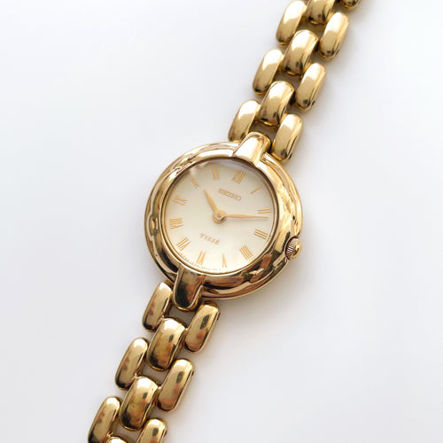Rare 90s Gold-Plated Seiko Tiss√© Quartz Watch with Round Dial and Thin Bracelet