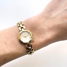 Load image into Gallery viewer, Rare 90s Gold-Plated Seiko Tiss√© Quartz Watch with Round Dial and Thin Bracelet
