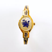 Load image into Gallery viewer, Vintage 00s Andr√© Mouche Quartz Watch with Beige and Blue Enamel Floral Design, Concealed Dial and Gold-Plated Bangle Bracelet - Boxed
