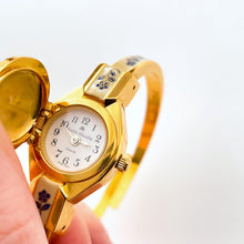 Load image into Gallery viewer, Vintage 00s Andr√© Mouche Quartz Watch with Beige and Blue Enamel Floral Design, Concealed Dial and Gold-Plated Bangle Bracelet - Boxed
