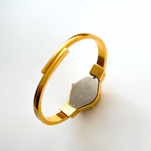Load image into Gallery viewer, Vintage 00s Andr√© Mouche Quartz Watch with Beige and Blue Enamel Floral Design, Concealed Dial and Gold-Plated Bangle Bracelet - Boxed
