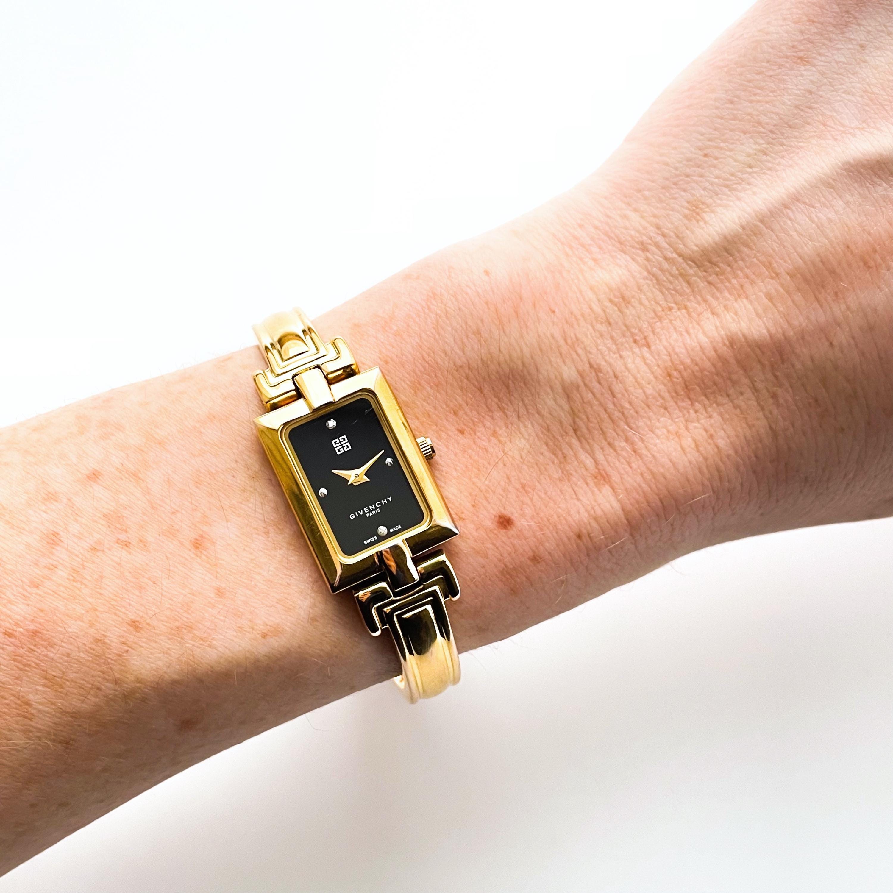 Givenchy Millésime – Gold-Plated Quartz Bangle Watch with Black