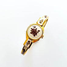Load image into Gallery viewer, Vintage Andr√© Mouche Quartz Watch with Pearl and Burgundy Enamel Floral Design, Concealed Dial and Gold-Plated Bangle Bracelet - Boxed
