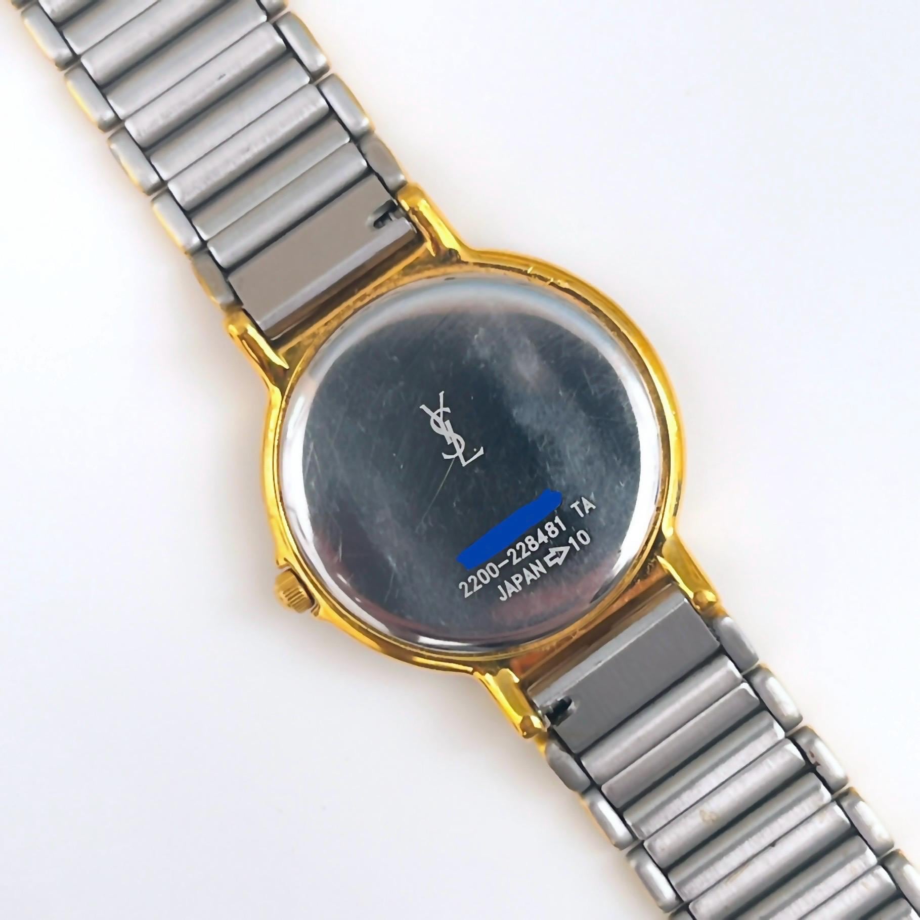 Yes Saint Laurent wrist watch, two tone stainless steel with date. Yves Saint Laurent Stainless Vintage Ladies Watch with Gilt  main image 2