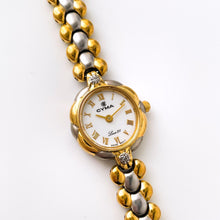 Load image into Gallery viewer, Thin Vintage 00s Two-Tone Ladies&#39; Cyma &quot;Louis XV&quot; Quartz Watch With Intricate Bracelet
