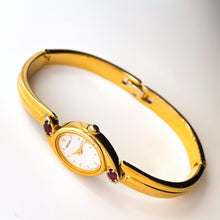 Load image into Gallery viewer, Very Rare 1990s Gold-Plated Seiko Articulated Bangle Quartz Watch with White Dial and Two Rubies
