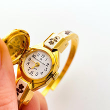 Load image into Gallery viewer, Vintage Andr√© Mouche Quartz Watch with Pearl and Burgundy Enamel Floral Design, Concealed Dial and Gold-Plated Bangle Bracelet - Boxed
