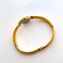 Load image into Gallery viewer, Very Rare 1990s Gold-Plated Seiko Articulated Bangle Quartz Watch with White Dial and Two Rubies
