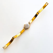 Load image into Gallery viewer, Very Rare 1990s Gold-Plated Seiko Articulated Bangle Quartz Watch with White Dial and Two Rubies
