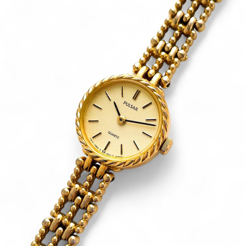 Vintage Ladies' Pulsar (by Seiko) Quartz Watch with Gold-Plated Bracelet and Round Dial