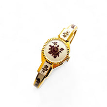 Load image into Gallery viewer, Vintage Andr√© Mouche Quartz Watch with Pearl and Burgundy Enamel Floral Design, Concealed Dial and Gold-Plated Bangle Bracelet - Boxed

