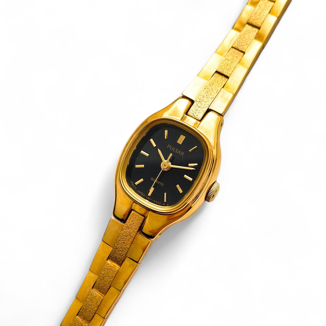 Tiny Ladies' Pulsar (by Seiko) Watch with Gold-Plated Bracelet and Black Dial