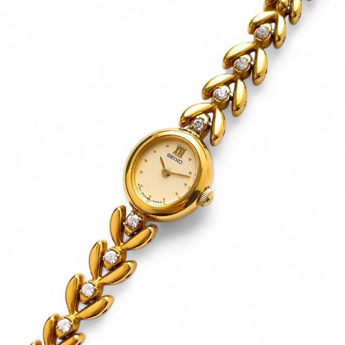 Very Rare 90s Gold-Plated Seiko Jewellery Quartz Watch with Tiny Oval Dial, Thin Bracelet and 8 Diamonds