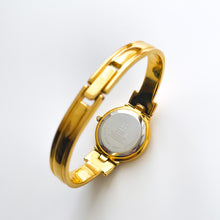 Load image into Gallery viewer, Vintage 1990s Gold-Plated Ladies&#39; Givenchy &#39;Millesime&#39; Bangle Watch with Black Dial and Quartz Movement
