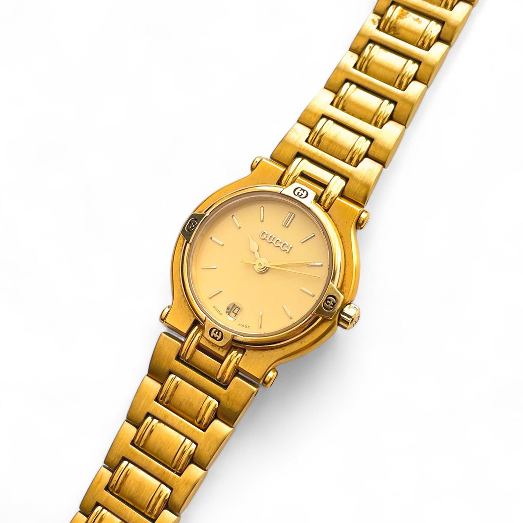 Vintage Gold-Plated Gucci 9200L Quartz Watch with Round Dial and Date Window