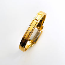 Load image into Gallery viewer, Vintage 1990s Gold-Plated Ladies&#39; Givenchy &#39;Millesime&#39; Bangle Quartz Watch with Black Rectangular Dial
