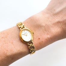 Load image into Gallery viewer, Gold-Tone Ladies&#39; Limit Quartz Watch with Oval Dial and Intricate Bracelet
