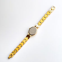 Load image into Gallery viewer, Gold-Tone Ladies&#39; Limit Quartz Watch with Oval Dial and Intricate Bracelet
