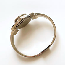 Load image into Gallery viewer, Vintage 1990s André Mouche Quartz Watch with Blue Enamel Floral Design, Concealed Dial and Silver-Tone Bangle Bracelet - Boxed
