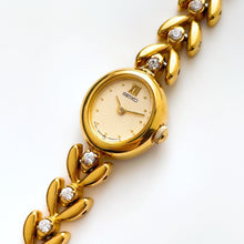 Load image into Gallery viewer, Very Rare 90s Gold-Plated Seiko Jewellery Quartz Watch with Tiny Oval Dial, Thin Bracelet and 8 Diamonds
