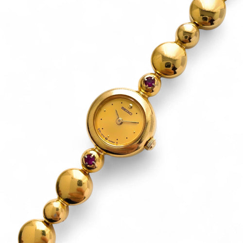 Seiko Jewellery Quartz Watch – Gold-Plated, Tiny Dial with 2 Rubies, 1990s