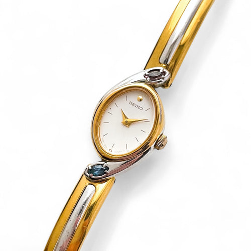 Very Rare 1990s Two-Tone Seiko Articulated Bangle Quartz Watch with White Dial and Crystal-Set Bezel