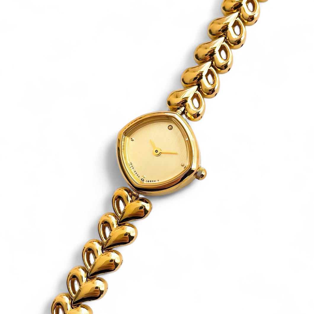 Dainty Ladies' Gold-Plated Quartz Watch with Heart Pattern Bracelet